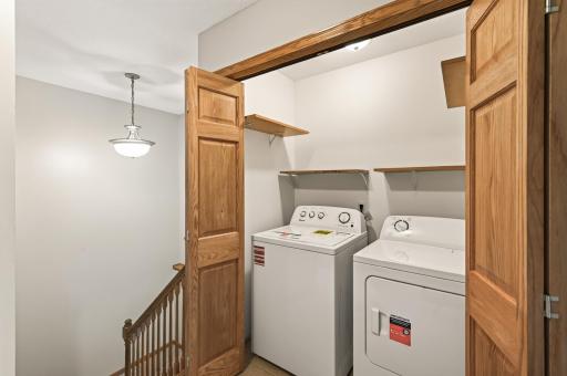 Upper Level Laundry: Skip hauling baskets up and down stairs with this dedicated upper-level laundry area equipped with a brand-new washer and dryer.