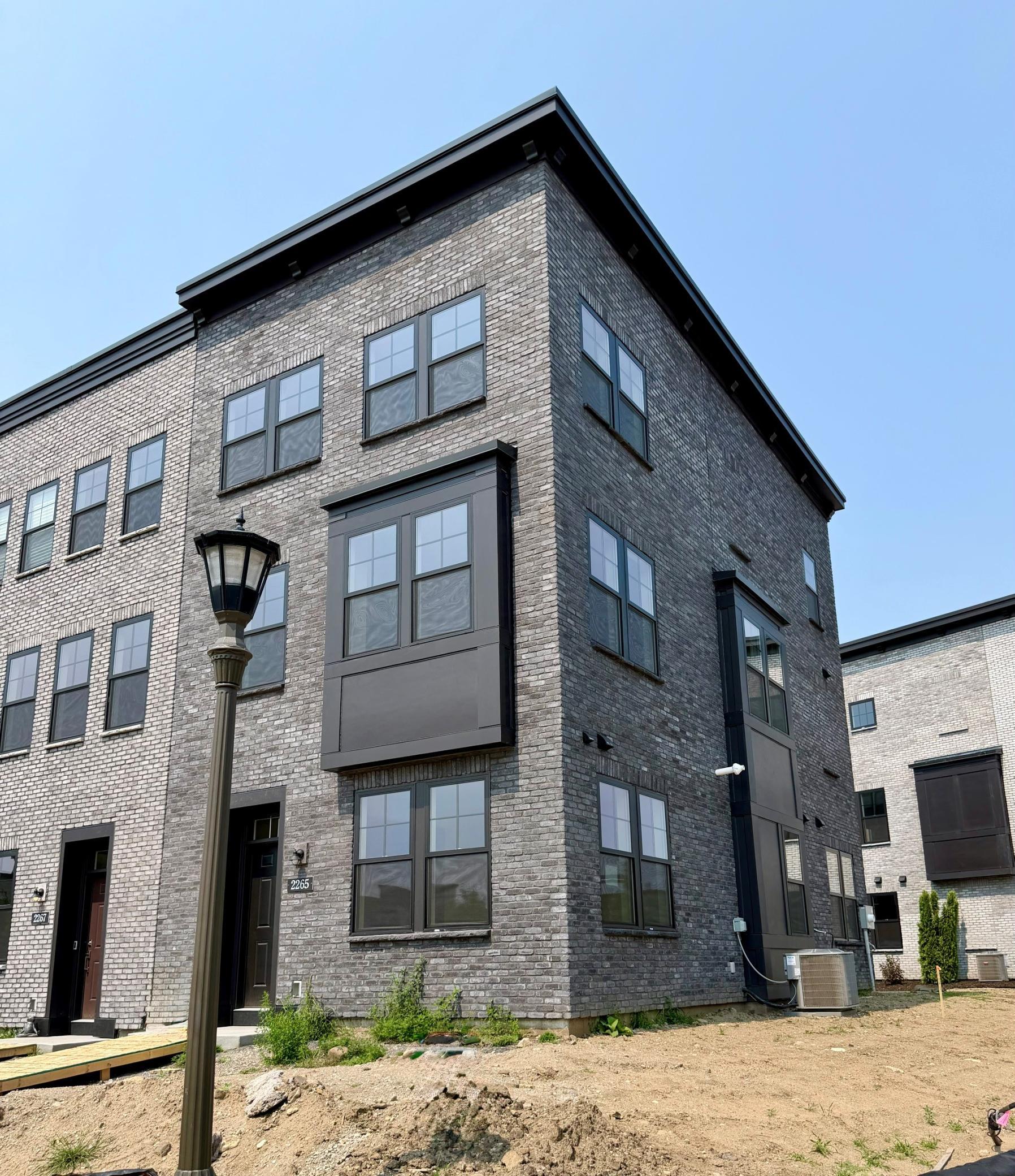End Unit with rare open park views in front and side can see into the central water feature area!