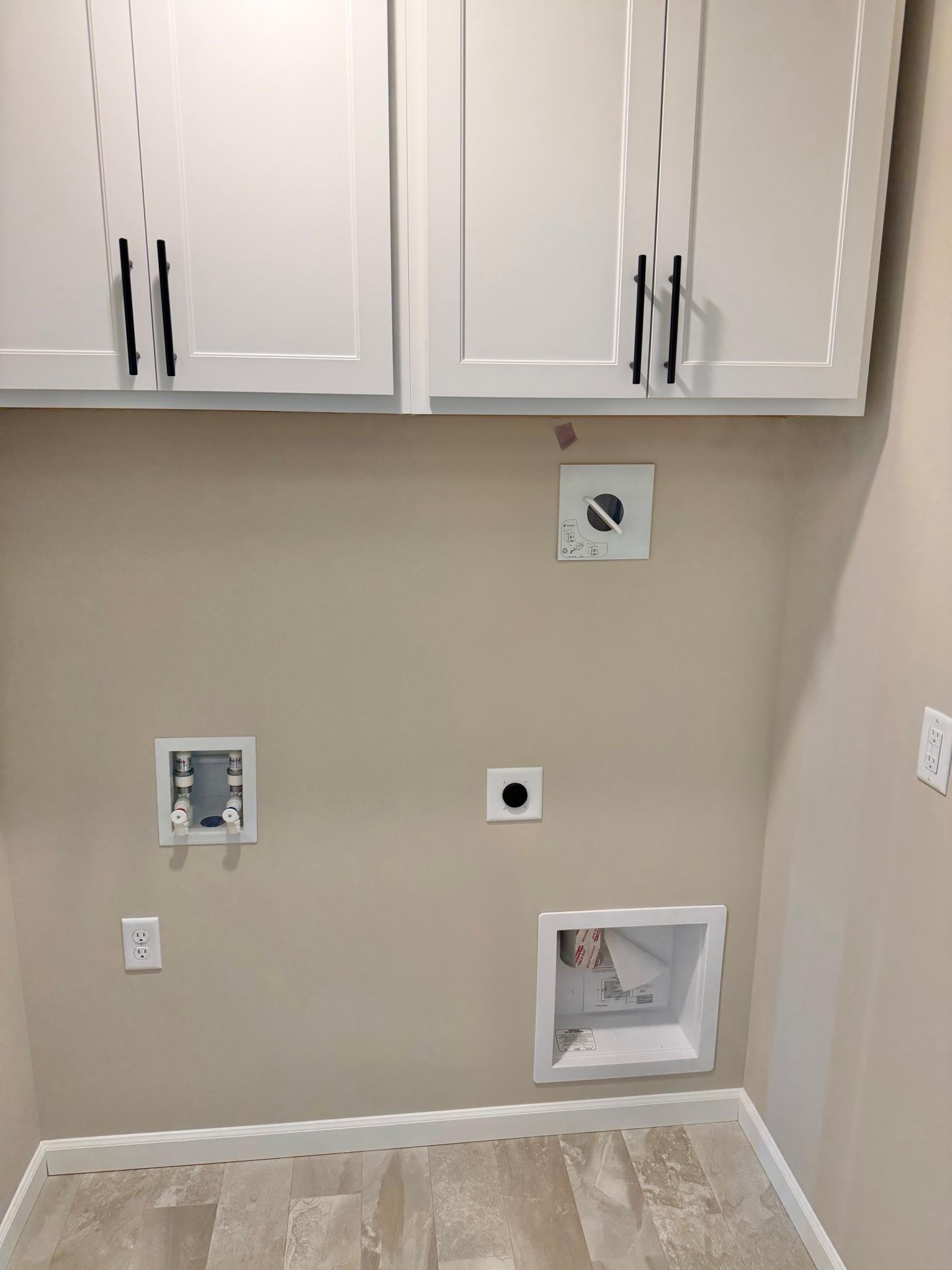 Convenient laundry on bedroom level.