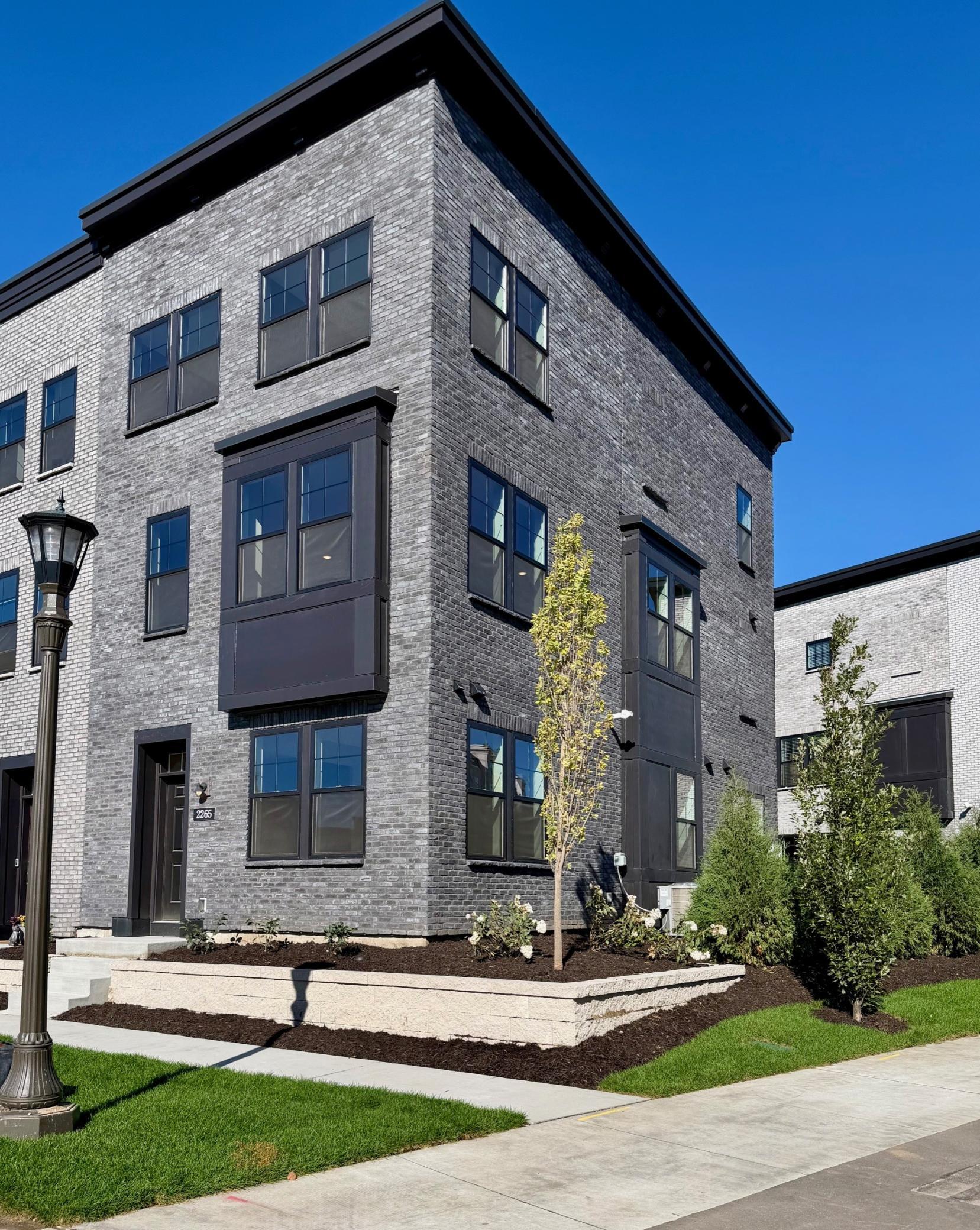 End Unit with rare open park views in front and side views into the central water feature area!