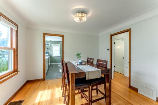 Another view of the dining room. Door to the right leads to bedrooms and bath.