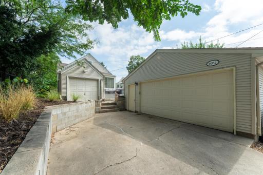 Two car garage wide enough for additional storage.