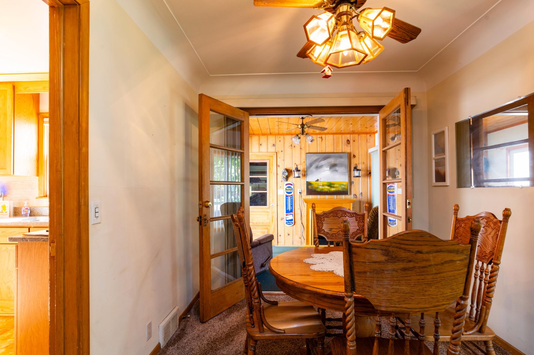 The dining area with direct access to updated kitchen and 3 season porch/breezeway.