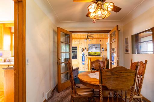 The dining area with direct access to updated kitchen and 3 season porch/breezeway.