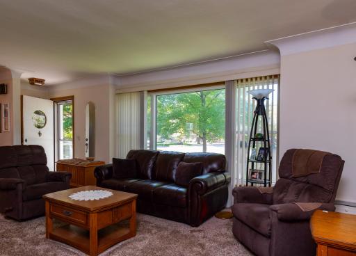The main front entry leads to large living room and front window.