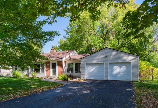One level home is situated on over a half acre level lot. It features a large double garage and a three season porch/breezeway with access to home and large deck.