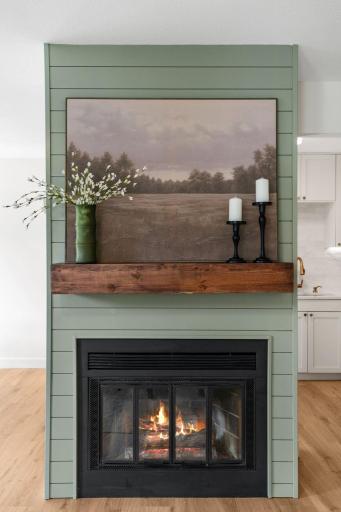 Working fireplace with shiplap and mantel