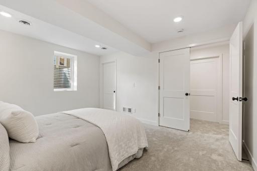 Spacious primary bedroom with walk-in closet and en-suite bathroom