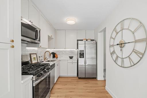 Beautiful tile backsplash and quartz countertops