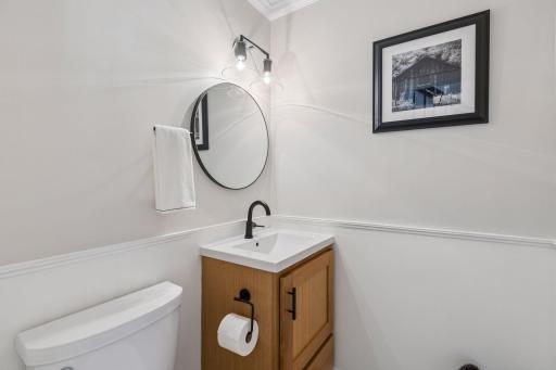 The main level features a convenient half bath