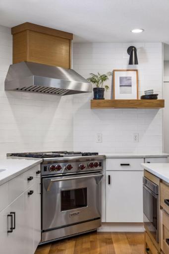 Upscale appliances, granite counters, stunning subway tile