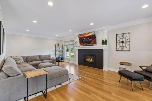 Relax in the spacious great room with recessed lighting and cozy gas fireplace
