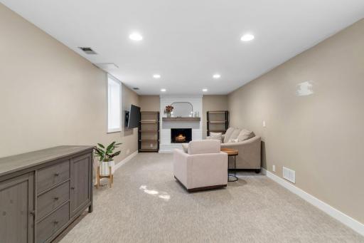 Bright basement family room with egress window
