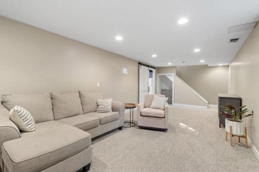 Spacious family room with under-stairs storage and giant utility room for more storage space