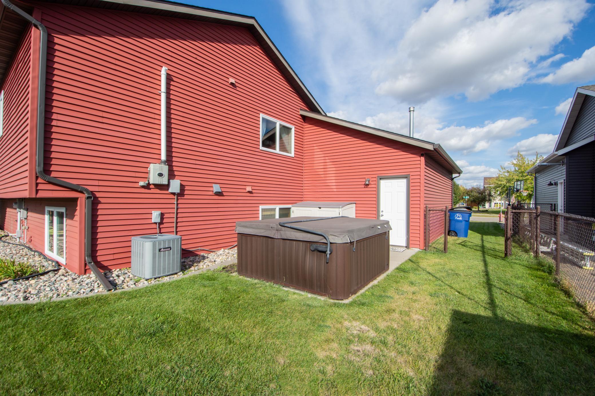 fully fenced yard with pond views