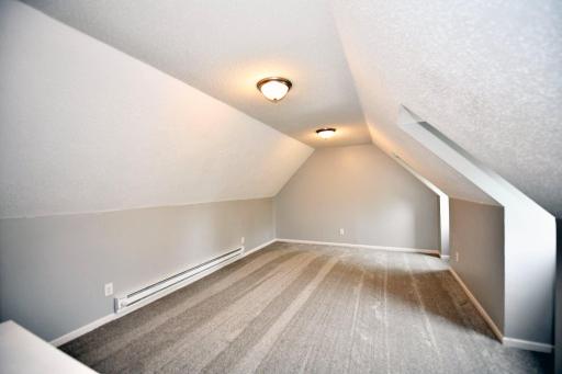 Another view of the large upper level bedroom. Brand new carpet!