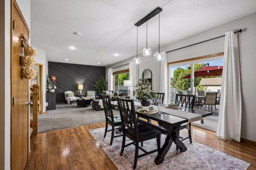 Open concept with beams of natural light and modern light.