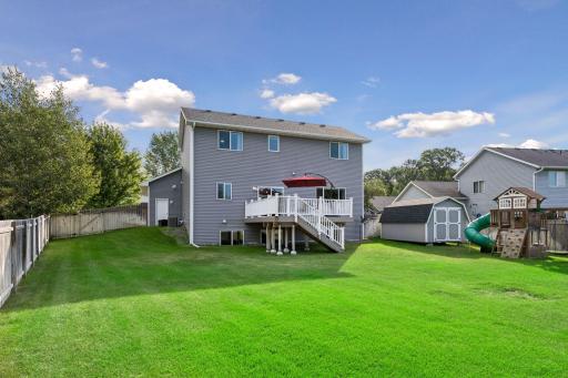 Maintenance free deck. Garage access from the backyard. Fully fenced in. Irrigation.