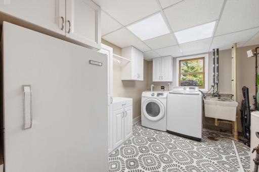 Multi functional laundry mechanical room with sink .jpg