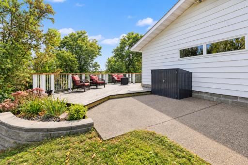 Step off the deck on to the Small Patio on Side of the Home