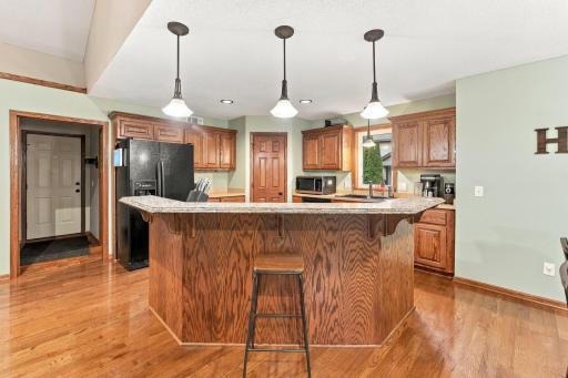 breakfast bar area - kirchen with pantry and plenty of cupboards