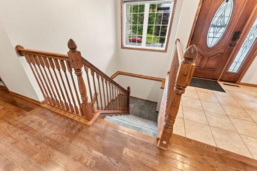 Entry foyer and stair to lower level New carpet on stairs