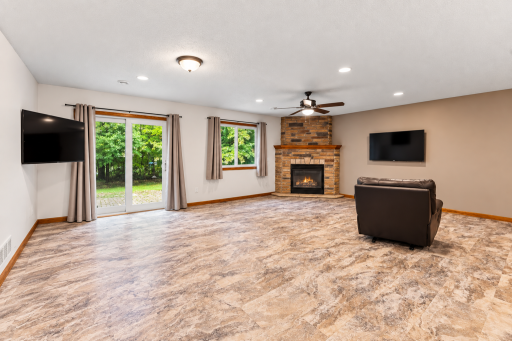 walk out family room with a gas fire place to enjoy those cozy evening.