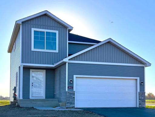 3042 Jandura Ave NE- New Construction Home will be ready for a November move-in! Highlights include a Walkout Lower Level ready for future finish. Landscaping, Sod, and Irrigation System included.