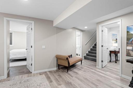 Updated lower level features family room, 2 additional bedrooms and spacious bath