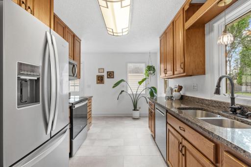 Kitchen w/ New Flooring, Oak Cabinets, Stainless Steel Appliances and Granite Counters