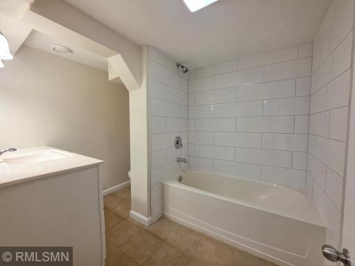 21_BathR in lowe level with new tiles wall.jpg