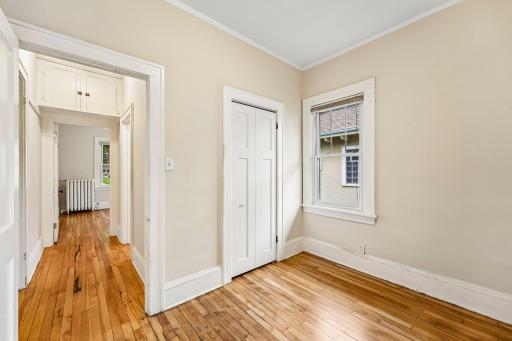 Bedroom with closet storage and easy hallway access