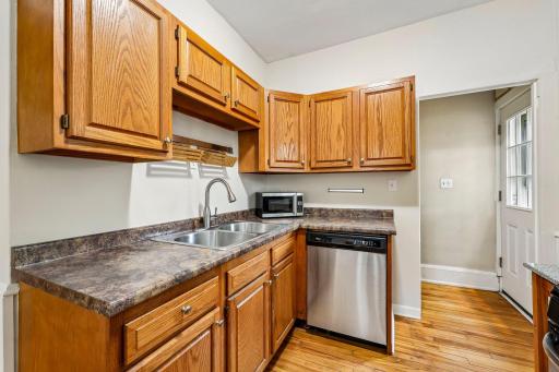 Kitchen with ample cabinetry, counter space, and dishwasher