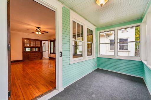 Enclosed porch flows directly into the main living area