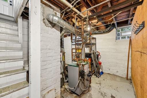 Lower-level utility area with accessible mechanical systems