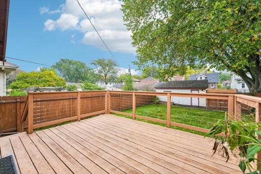 Deck overlooking the backyard and mature trees