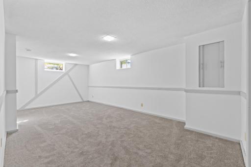 The finished lower level adds valuable living space with new carpet, fresh paint and updated lighting. Enjoy a second living space for easy entertaining!