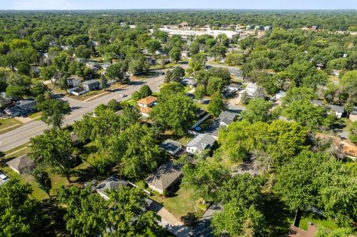 A wider aerial view showcases the surrounding neighborhood and convenient Blaine location.