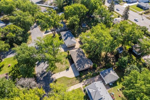 Another aerial perspective highlights the home's convenient location within a mature residential neighborhood.