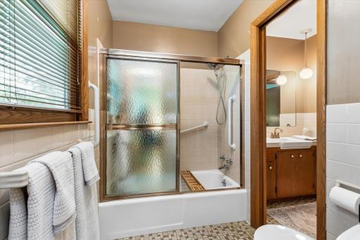 pocket door separates shower & stool from sink for privacy