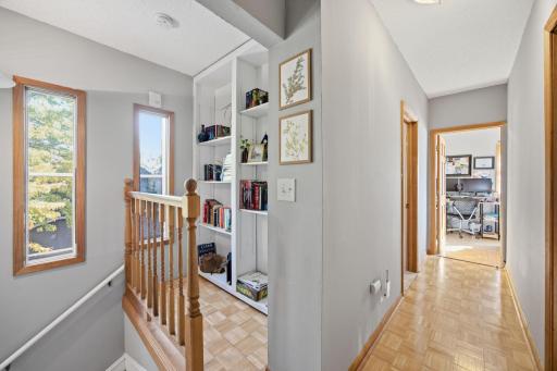 Upstairs is a cute library area. All the floors are parkay hardwood flooring. 3 windows bring in plenty of sunshine from the East.