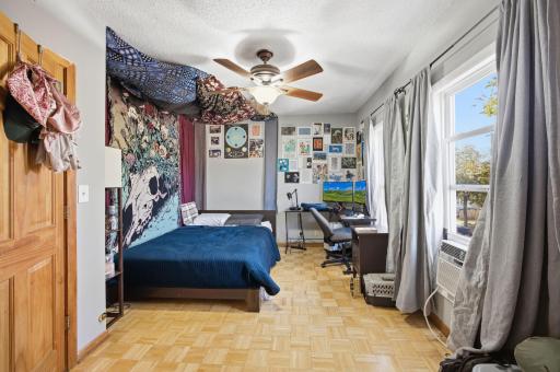 3rd bedroom in the front (facing North). Hardwood floors. Spacious closets. Ceiling fan.