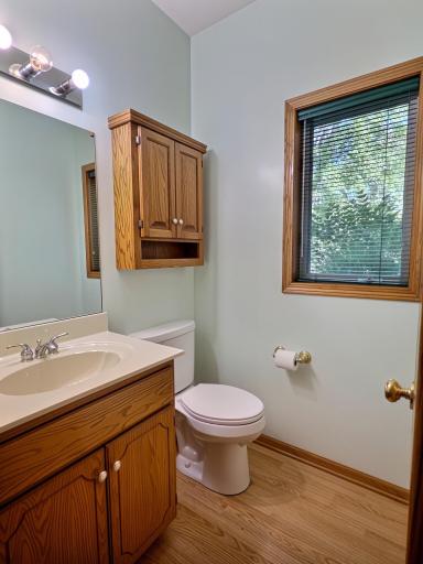 Main level half of bath is located as you enter from the garage and just off the dining room.