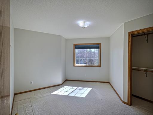 The third bedroom on the upper level conveniently located near the full bath.