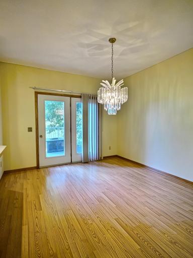 Dining room with walk out door to lakeside deck.