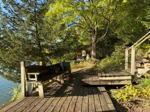 The lakeside deck area is ready for next buyer to enhance the landscaping down by the water and create a fresh lakeside oasis.