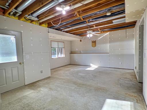 Lower level is currently unfinished but quick value adder with finishing the lower level adding another bedroom and bath. Lower level walks out patio area and yard lake side.