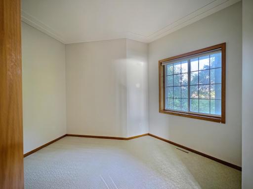 Main floor den, would also be a ideal home office, playroom, or sitting area.