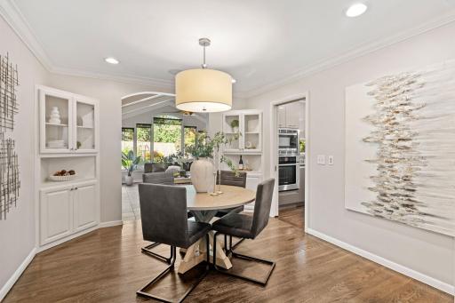 Dining Room with Seamless Flow Between Living, Kitchen, and Sunroom