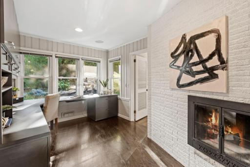 Main Level Office with Wood-Burning Fireplace and Custom Built-In Desk